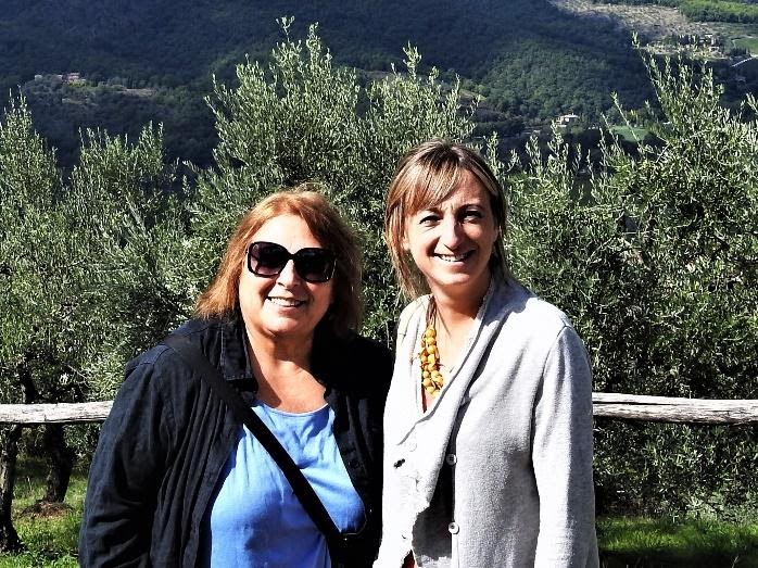 Two people posing for a pictureDescription automatically generated
