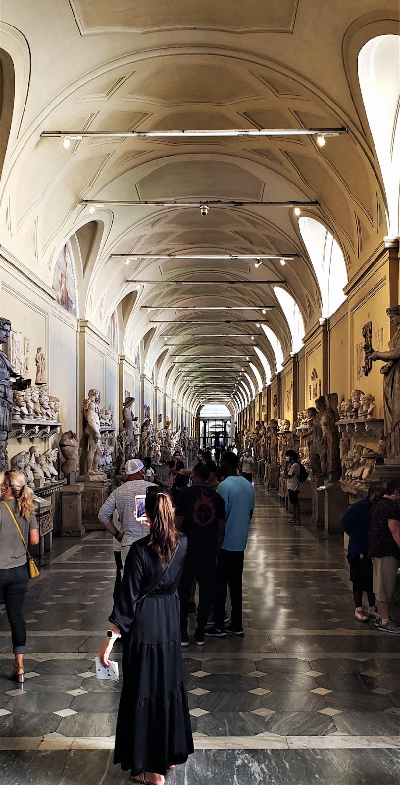 A picture containing building, aisle, colonnadeDescription automatically generated