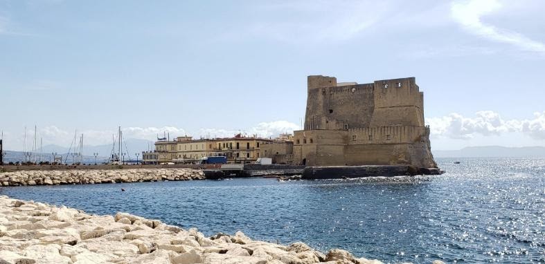 A picture containing sky, outdoor, water, shoreDescription automatically generated