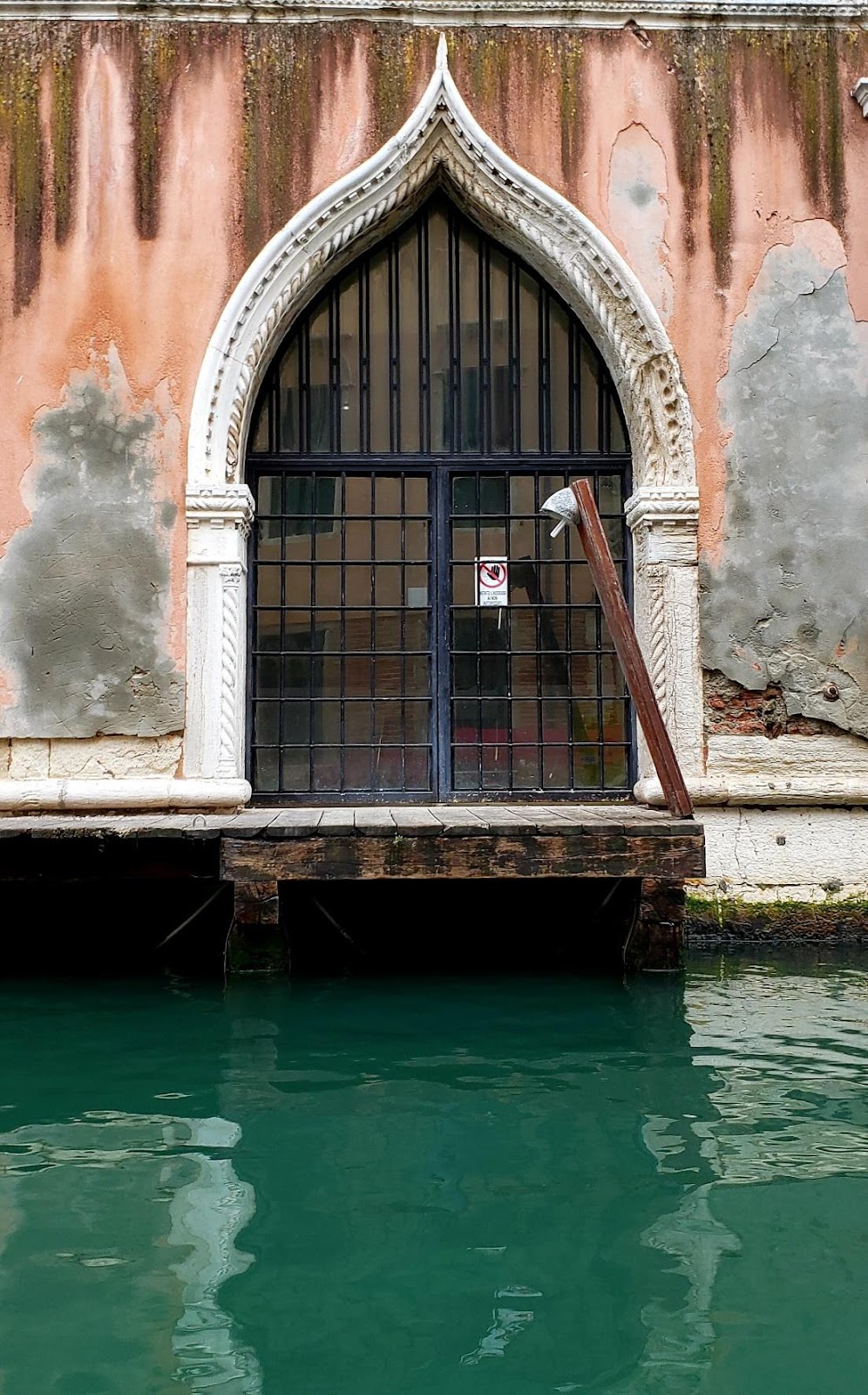 A picture containing water, outdoor, building, oldDescription automatically generated