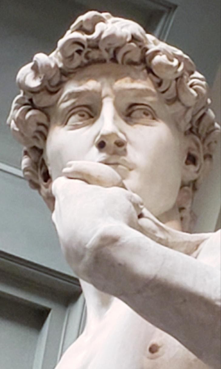 A statue of a personDescription automatically generated with medium confidence