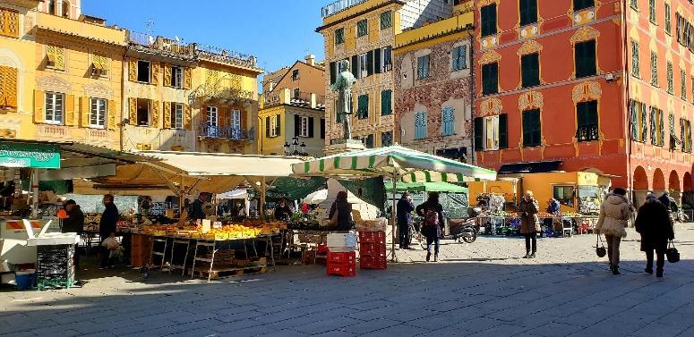 A picture containing building, outdoor, street, peopleDescription automatically generated