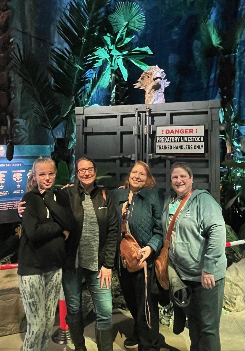 A group of people posing for a photoDescription automatically generated