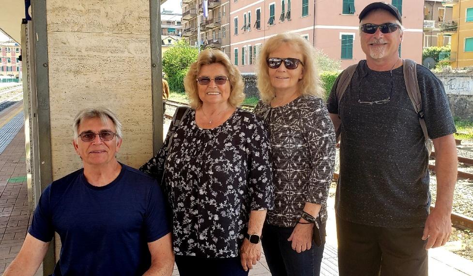 A group of people posing for a photoDescription automatically generated