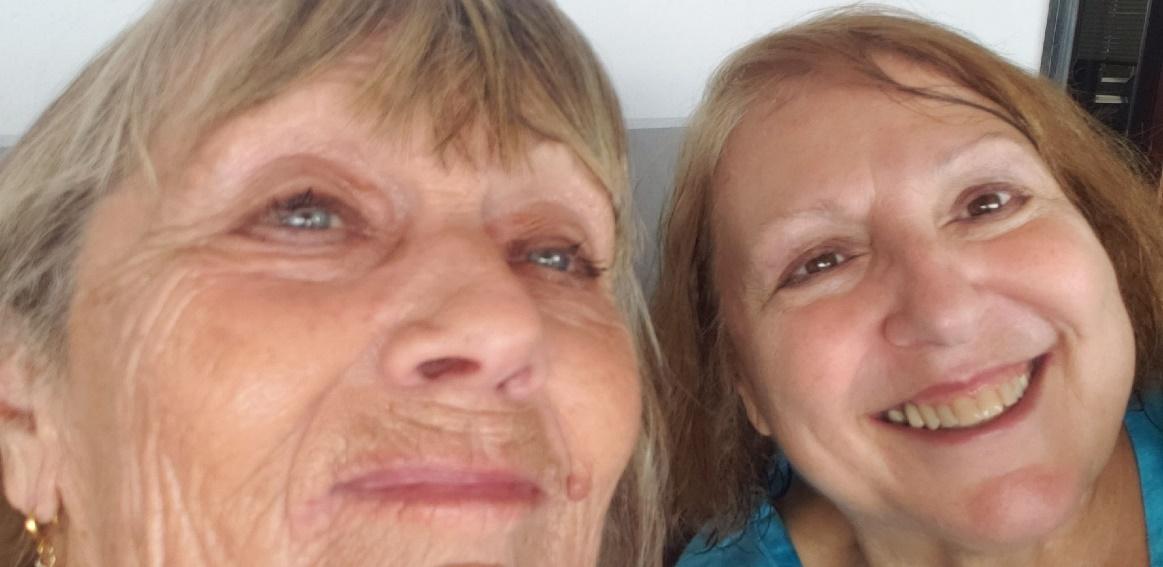 A picture containing person, smiling, person, posingDescription automatically generated