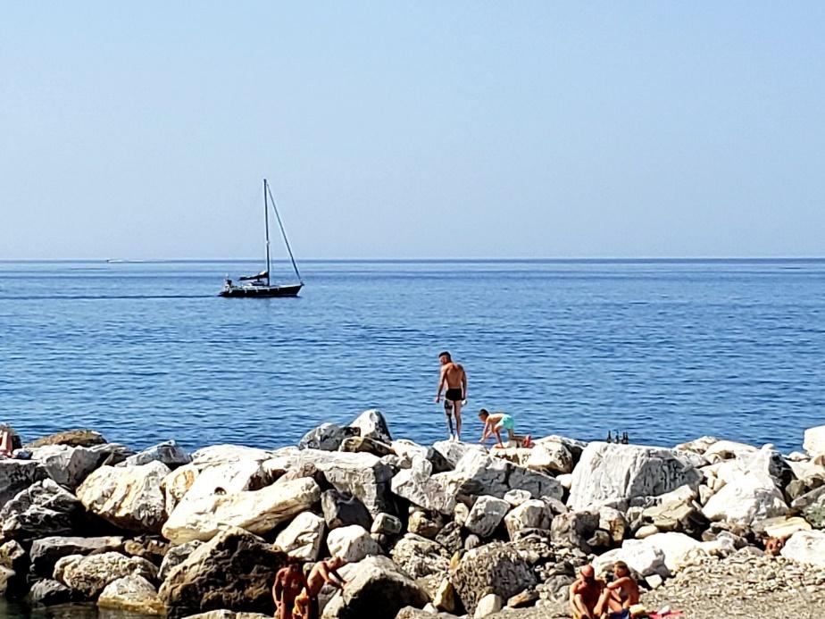 A picture containing water, outdoor, sky, rockDescription automatically generated