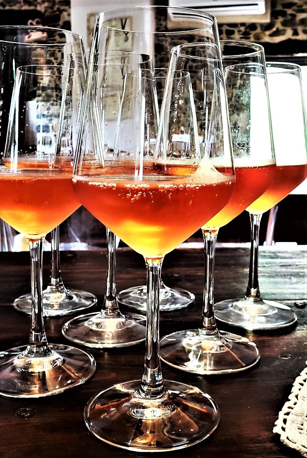 A picture containing wine, table, container, glassDescription automatically generated