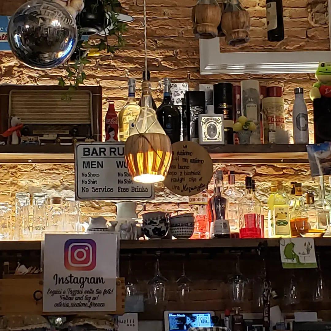 A picture containing text, indoor, items, clutteredDescription automatically generated
