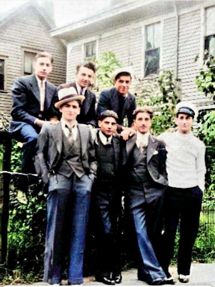 A group of people posing for a photoDescription automatically generated