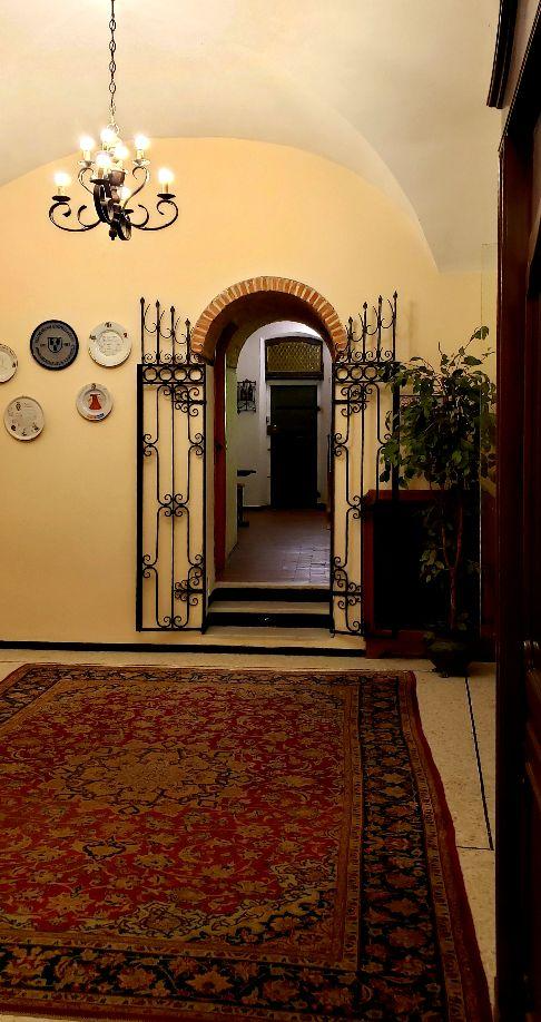 A picture containing indoor, wall, rug, floorDescription automatically generated