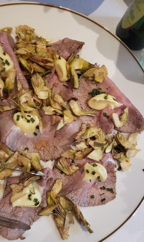 A picture containing food, plate, animal fat, roast beefDescription automatically generated