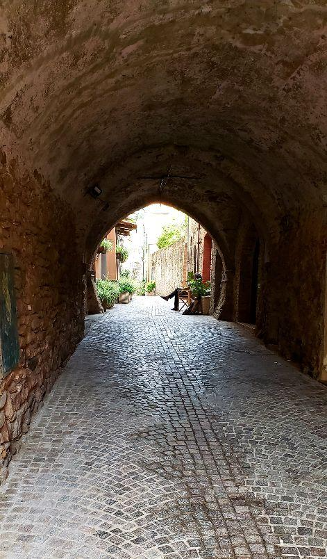 A picture containing outdoor, ground, building, cobblestoneDescription automatically generated
