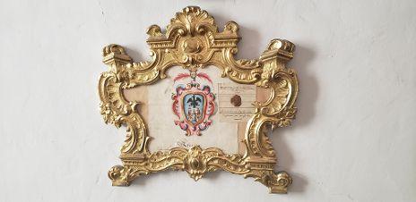 A picture containing brass, bronze, mirror, wallDescription automatically generated