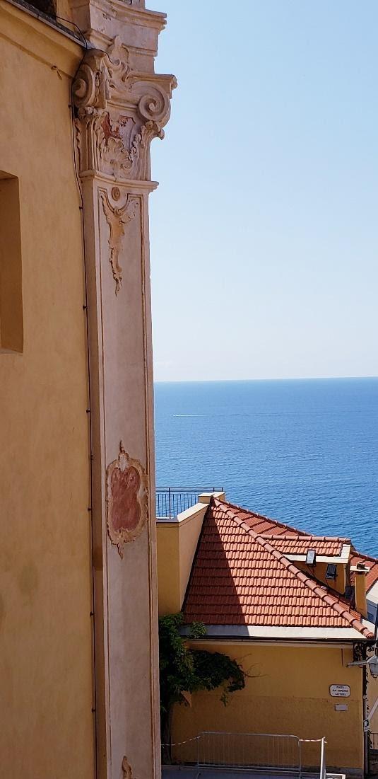 A picture containing outdoor, sky, house, buildingDescription automatically generated