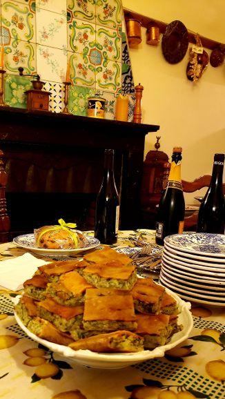 A table with plates and food on itDescription automatically generated with low confidence