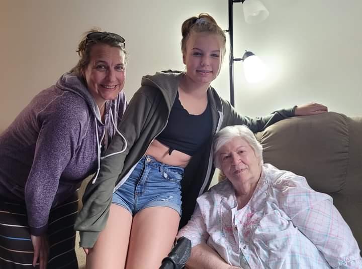 A group of women posing for a pictureDescription automatically generated