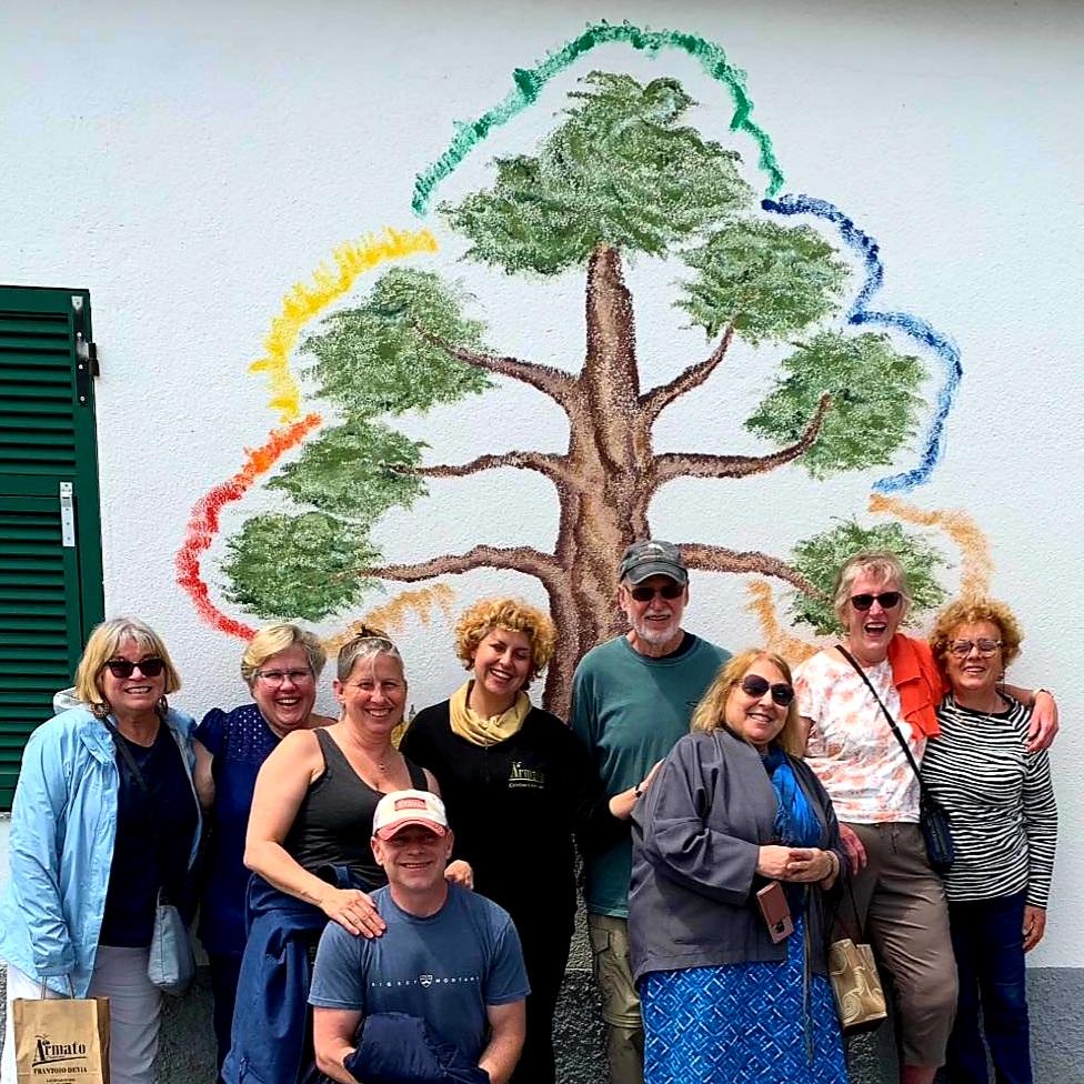 A group of people posing for a photoDescription automatically generated