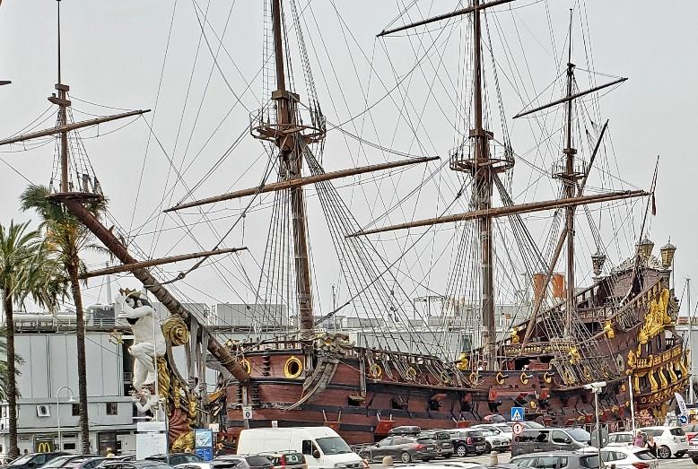 A large ship in a harborDescription automatically generated