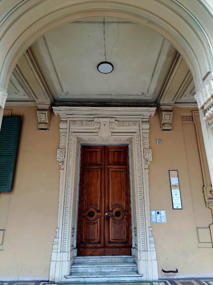 A door with a stone archDescription automatically generated with medium confidence