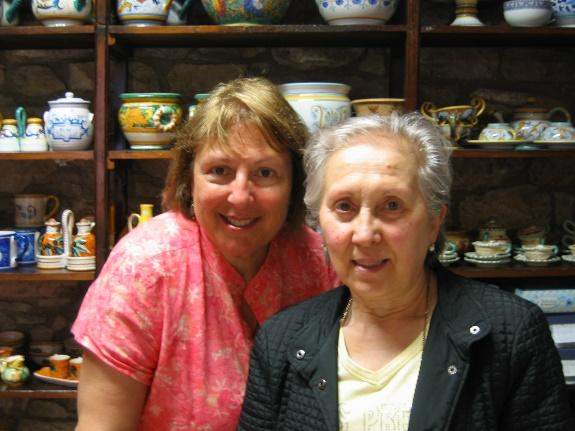 A couple of women posing for a photoAI-generated content may be incorrect.