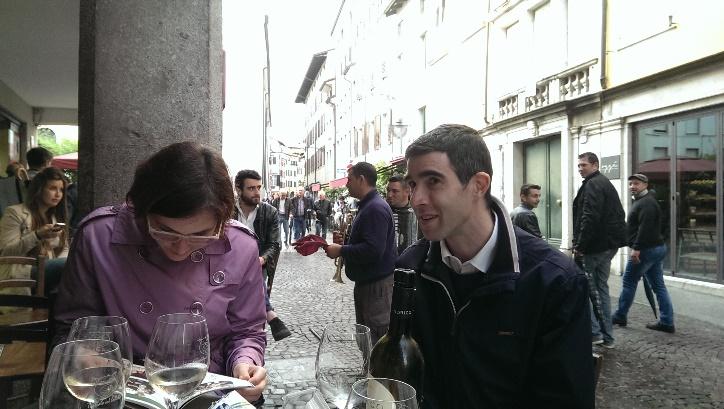 A person and person looking at a paperAI-generated content may be incorrect.