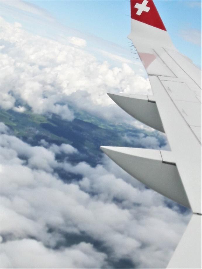 A picture containing sky, outdoor, plane, clouds

Description generated with very high confidence